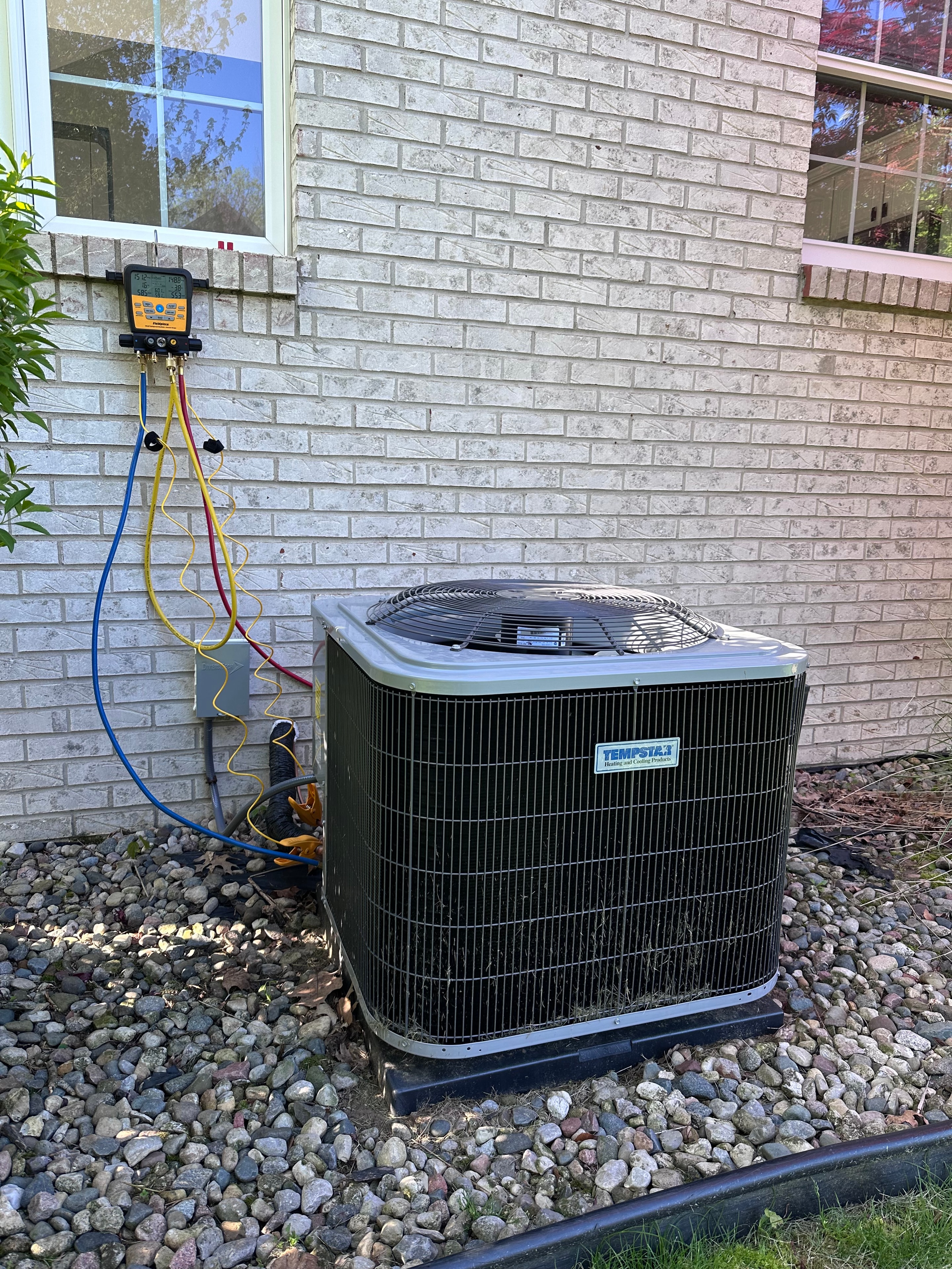 Tempstar central air conditioner condenser installation at a Southeast Michigan home
